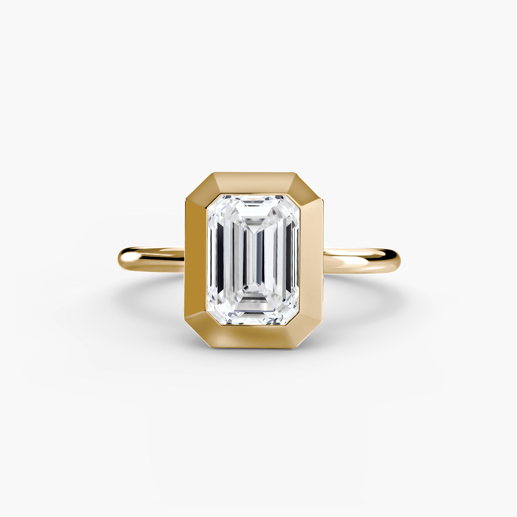 Jacob Mercari 14K Yellow Gold Lab Grown Diamond Engagement Ring: Emerald cut Solitaire Diamond with a Bezel Setting.