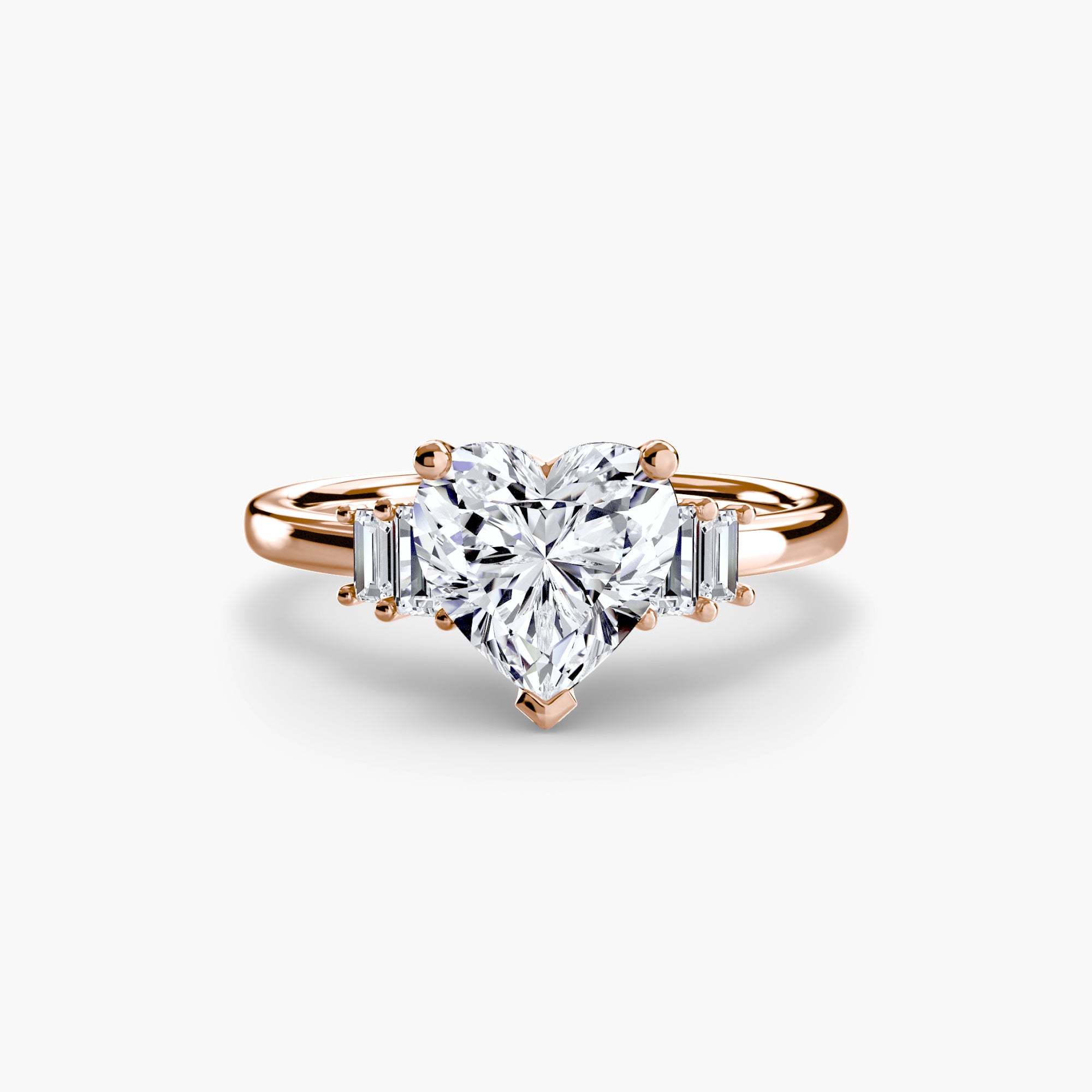 Jacob Mercari 14K Rose Gold Lab Grown Diamond Engagement Ring: Heart Cut Centre Diamond with baguette side diamonds.