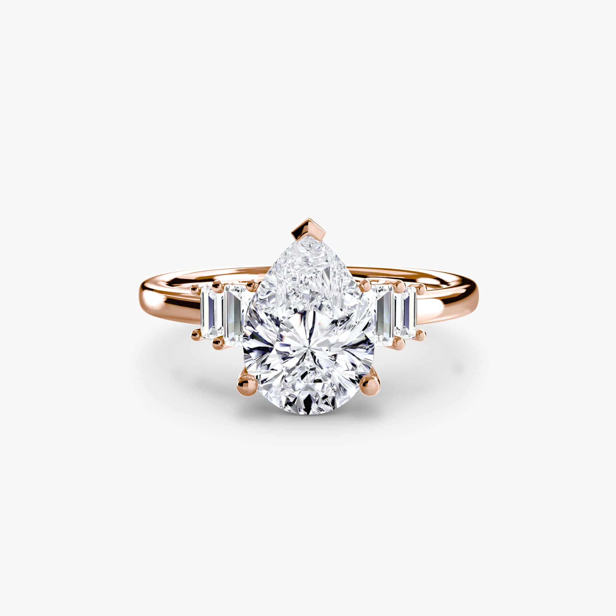 Jacob Mercari 14K Rose Gold Lab Grown Diamond Engagement Ring: Pear Cut Centre Diamond with baguette side diamonds.