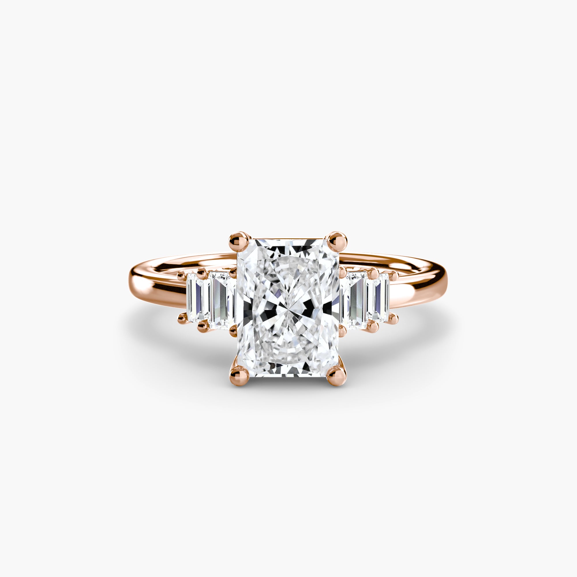 Jacob Mercari 14K Rose Gold Lab Grown Diamond Engagement Ring: Radiant Cut Centre Diamond with baguette side diamonds.