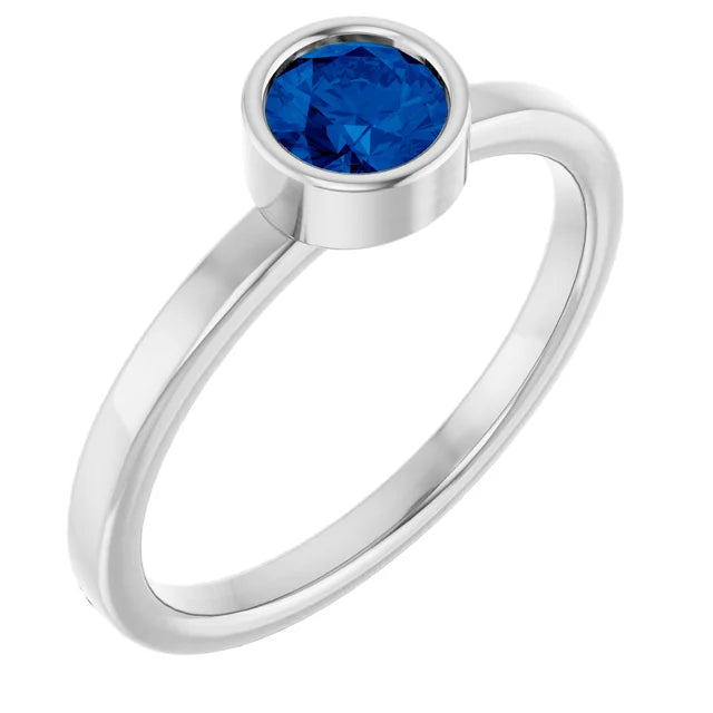 Blue round sapphire ring