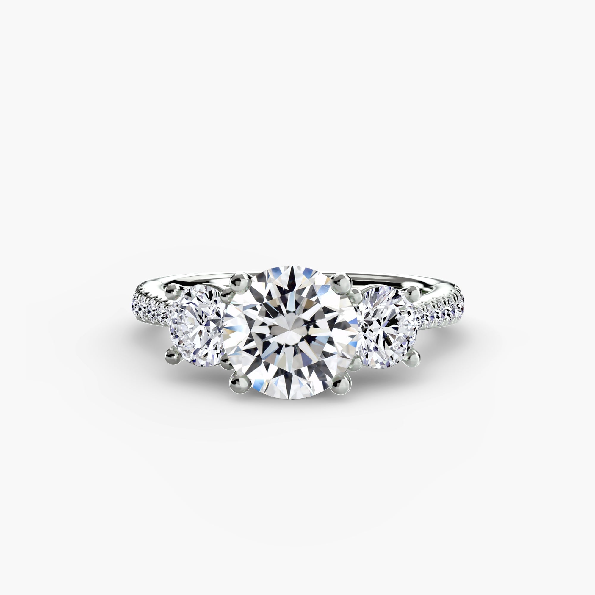 Jacob Mercari 14K White Gold Lab Grown Diamond Engagement Ring: Round Cut Centre Diamond with 2 Round Cut side diamonds on a Pavé Band.